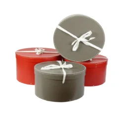 Boîte à chapeaux rouge avec ruban blanc (M)
