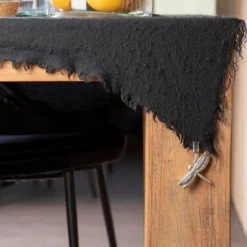 4 poids en fonte pour nappe