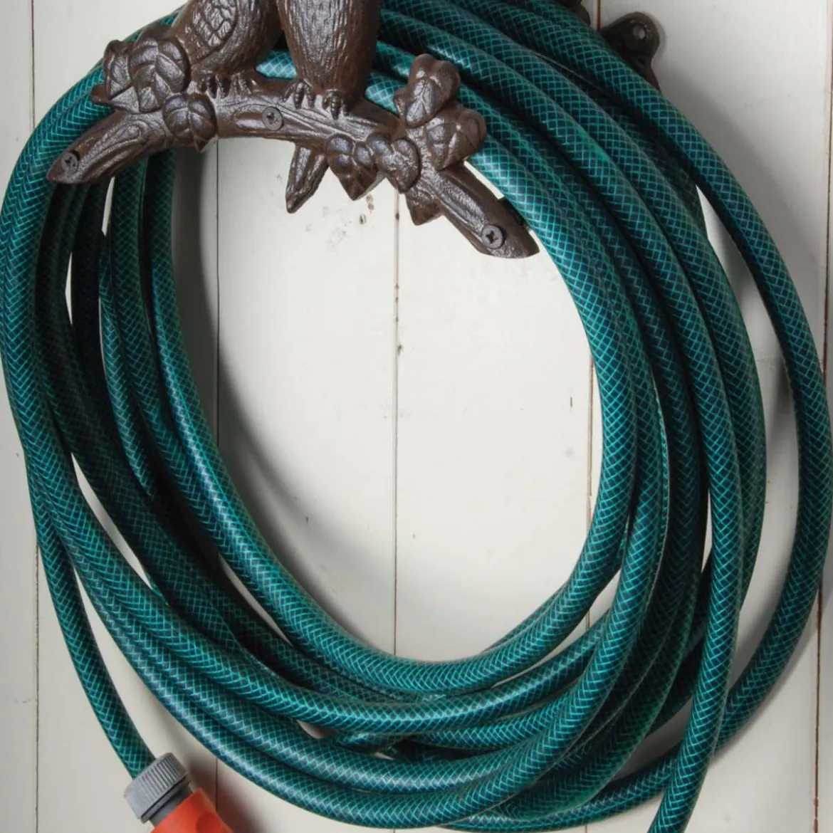Porte tuyau d'arrosage en fonte