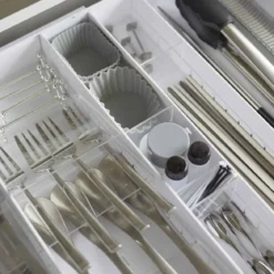 Range-couverts extensible gain de place