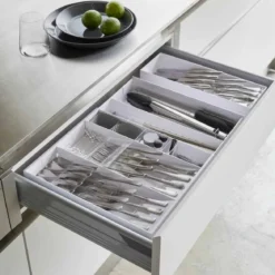 Range-couverts extensible gain de place