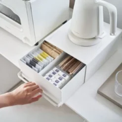 Rangement coulissant pour plan de travail